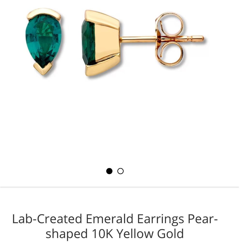 Emerald pear shaped studs
